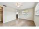 Bedroom with tile floors and access to bathroom at 2124 16Th Sw Ave, Largo, FL 33770