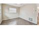 Simple bedroom with tile floors and window blinds at 2124 16Th Sw Ave, Largo, FL 33770