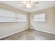 Bright bedroom with tile floors and multiple windows at 2124 16Th Sw Ave, Largo, FL 33770