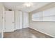 Bright bedroom with tile floors, large closet, and window blinds at 2124 16Th Sw Ave, Largo, FL 33770