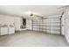 Attached garage with laundry area and extra space at 2124 16Th Sw Ave, Largo, FL 33770