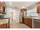 Modern kitchen with granite countertops and stainless steel appliances at 2124 16Th Sw Ave, Largo, FL 33770