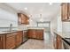 Updated kitchen with granite countertops and island at 2124 16Th Sw Ave, Largo, FL 33770