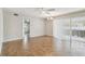 Spacious living area with tile floors and access to patio at 2124 16Th Sw Ave, Largo, FL 33770