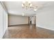 Spacious living room featuring tile floors and multiple ceiling fans at 2124 16Th Sw Ave, Largo, FL 33770