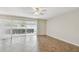 Bright and airy living room with tile floors and sliding doors at 2124 16Th Sw Ave, Largo, FL 33770
