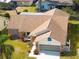 Single-Gathering home with two-car garage and spacious yard at 2249 Grandfather Mtn, Spring Hill, FL 34606