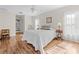 Main bedroom with wood floors and access to private bathroom at 2249 Grandfather Mtn, Spring Hill, FL 34606