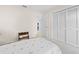 Small bedroom with a twin bed and built-in closet at 2249 Grandfather Mtn, Spring Hill, FL 34606