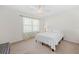 Cozy bedroom with a double bed and neutral colored carpet at 2249 Grandfather Mtn, Spring Hill, FL 34606