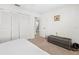 Bedroom with a double bed, built-in closet and view of another room at 2249 Grandfather Mtn, Spring Hill, FL 34606