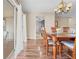 Dining area with wood table and access to patio at 2249 Grandfather Mtn, Spring Hill, FL 34606