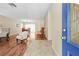 Bright entryway with wood floors and views into the living and dining areas at 2249 Grandfather Mtn, Spring Hill, FL 34606