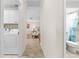 Hallway connecting laundry room to living areas and bathroom at 2249 Grandfather Mtn, Spring Hill, FL 34606