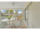 Sunroom features ample seating and access to the backyard at 2249 Grandfather Mtn, Spring Hill, FL 34606