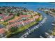 Aerial view of community with waterfront access and boat docks for residents at 2353 Hanover Dr, Dunedin, FL 34698