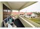 Relaxing balcony with outdoor seating and views of the neighborhood at 2353 Hanover Dr, Dunedin, FL 34698