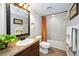 Well-maintained bathroom features a vanity, mirror, and bathtub with shower, offering a functional and clean space at 2353 Hanover Dr, Dunedin, FL 34698