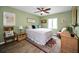 Cozy bedroom features a comfortable bed, soft lighting, and tasteful decor, creating a relaxing retreat at 2353 Hanover Dr, Dunedin, FL 34698