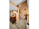Entryway with staircase leading to upper level, showcasing traditional design elements and warm, inviting tones at 2353 Hanover Dr, Dunedin, FL 34698