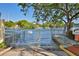 Gated boat ramp area with access to the water, caution signs and surrounding lush Florida vegetation at 2424 W Tampa Bay Blvd # B201, Tampa, FL 33607