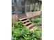 Wooden steps leading to the front entrance at 283 Brennan St, Brooksville, FL 34601