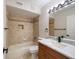 Updated bathroom with new vanity, tile, and fixtures at 291 Winchester Way, Palm Harbor, FL 34684