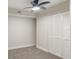 Spacious bedroom with ceiling fan and closet at 291 Winchester Way, Palm Harbor, FL 34684
