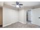 Well-lit bedroom with ceiling fan and closet at 291 Winchester Way, Palm Harbor, FL 34684