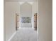 Spacious bedroom with a large window and ample closet space at 291 Winchester Way, Palm Harbor, FL 34684