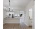 Modern kitchen, dining area, and bathroom at 291 Winchester Way, Palm Harbor, FL 34684