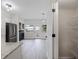Modern kitchen with stainless steel appliances at 291 Winchester Way, Palm Harbor, FL 34684