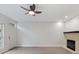 Living room with fireplace and hardwood floors at 291 Winchester Way, Palm Harbor, FL 34684