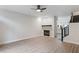Living room with fireplace and laminate floors at 291 Winchester Way, Palm Harbor, FL 34684