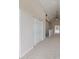 Spacious loft area with high ceilings and carpet at 291 Winchester Way, Palm Harbor, FL 34684