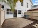 Private patio with concrete slab, providing an outdoor space at 291 Winchester Way, Palm Harbor, FL 34684