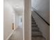 Carpeted staircase leading upstairs at 291 Winchester Way, Palm Harbor, FL 34684