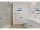 Bathroom with walk-in shower and stylish tile at 2912 N 16Th St # 1/2, Tampa, FL 33605