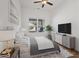 Bright bedroom with wood flooring, ceiling fan and large window at 2912 N 16Th St # 1/2, Tampa, FL 33605
