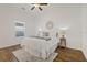 Bright bedroom with wood floors and ceiling fan at 2912 N 16Th St # 1/2, Tampa, FL 33605