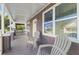 Relaxing front porch with two chairs, perfect for enjoying the outdoors at 2912 N 16Th St # 1/2, Tampa, FL 33605