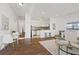Open concept living area with hardwood floors and modern kitchen at 2912 N 16Th St # 1/2, Tampa, FL 33605