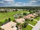 Home with pool and golf course view in the background at 34303 Sahalee Loop, Dade City, FL 33525