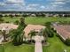 One story house with driveway and golf course view at 34303 Sahalee Loop, Dade City, FL 33525