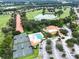 Community overview featuring tennis courts, pool, and clubhouse at 34303 Sahalee Loop, Dade City, FL 33525