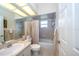Clean bathroom with tub and shower, updated vanity at 34303 Sahalee Loop, Dade City, FL 33525