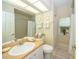 Clean bathroom with shower/tub combo and updated vanity at 34303 Sahalee Loop, Dade City, FL 33525