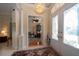 Bright entryway with double doors and view into home office at 34303 Sahalee Loop, Dade City, FL 33525