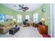 Bright home office features built-in shelving and large windows at 34303 Sahalee Loop, Dade City, FL 33525