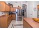 Kitchen with stainless steel appliances and granite countertops at 34303 Sahalee Loop, Dade City, FL 33525
